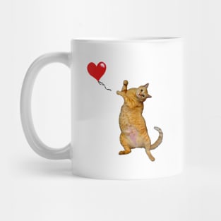 Cat releasing heart balloon Mug